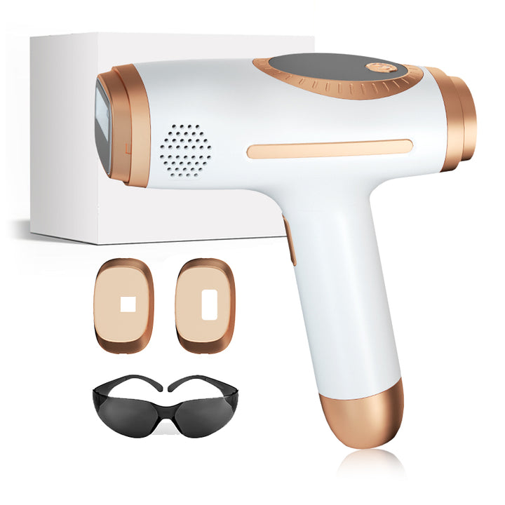 TS10S white and gold handheld IPL device with pictured accessories